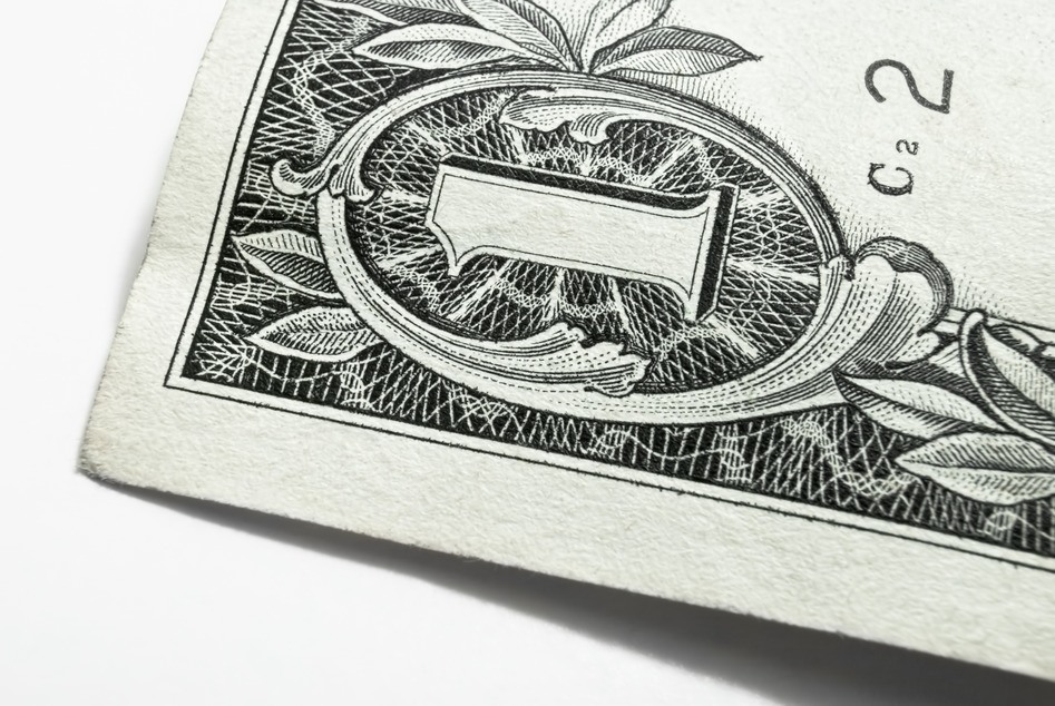 Top left corner of a banknote of 1 US dollar. Macro