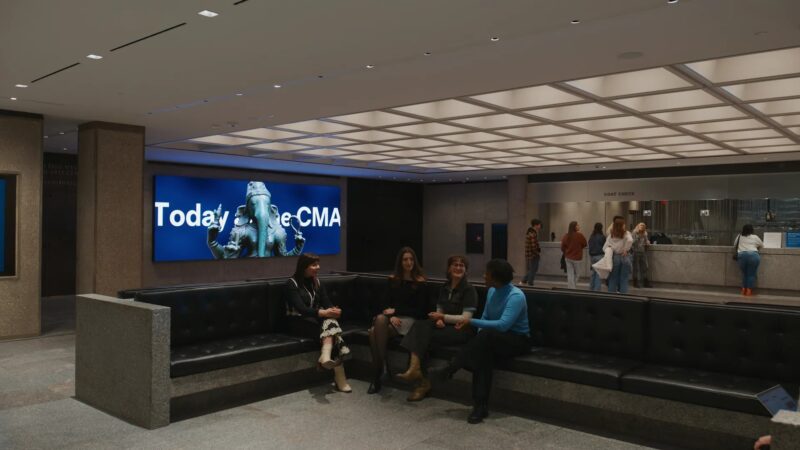 The video wall in the Horace Kelley Art Foundation Lobby supports wayfinding and exhibition information